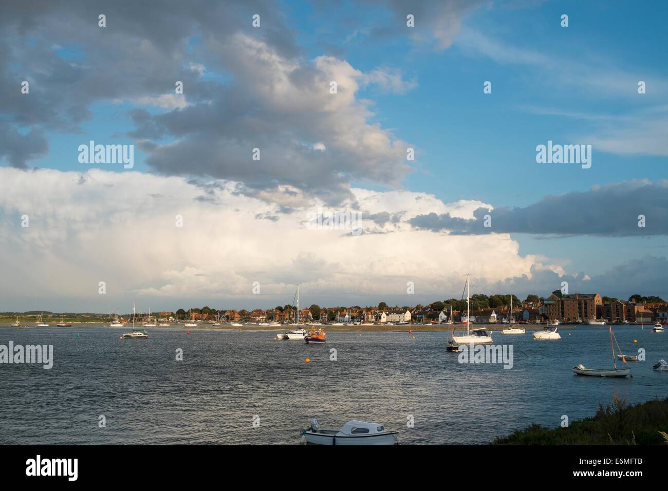 View of Well Harbour with dramtic skies and storm clouds, Stock Photo