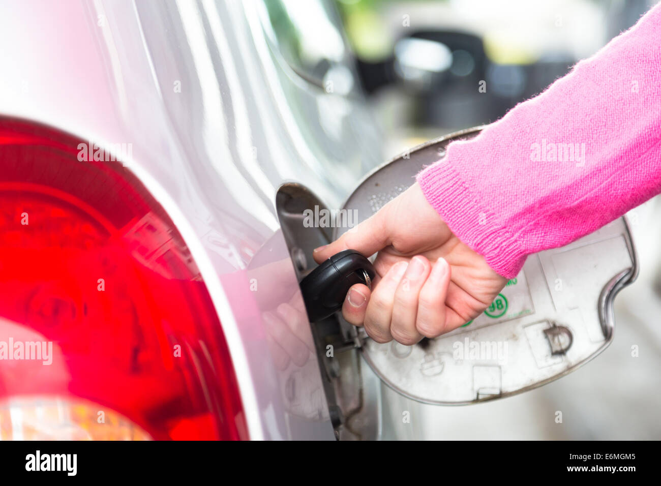 Opening the fuel tank with a key Stock Photo