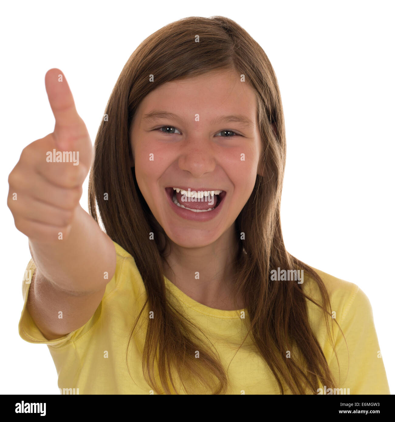 Smiling girl showing thumbs up, isolated on a white background Stock ...