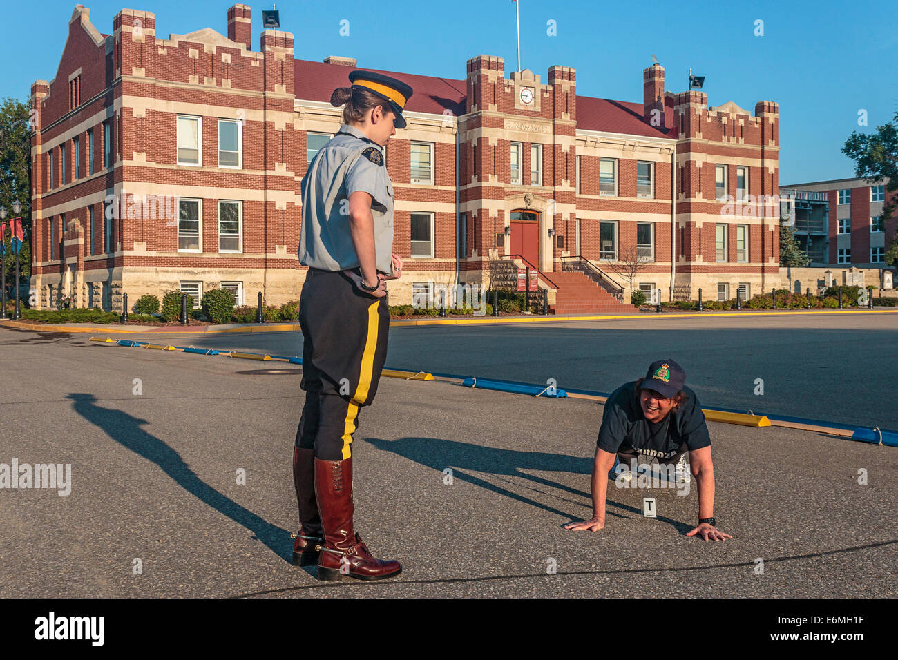 Punishment pushups at the RCMP Depot cadet training academy in Regina, Saskatchewan, Canada. Stock Photo
