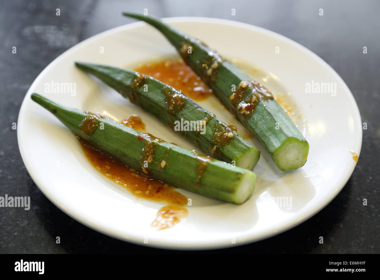 fresh okra with spicy sauce prepare for grilled Stock Photo Alamy