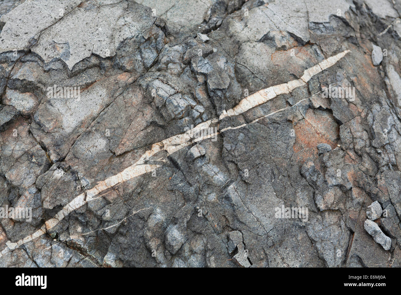 Quartz vein in granite rock - California USA Stock Photo