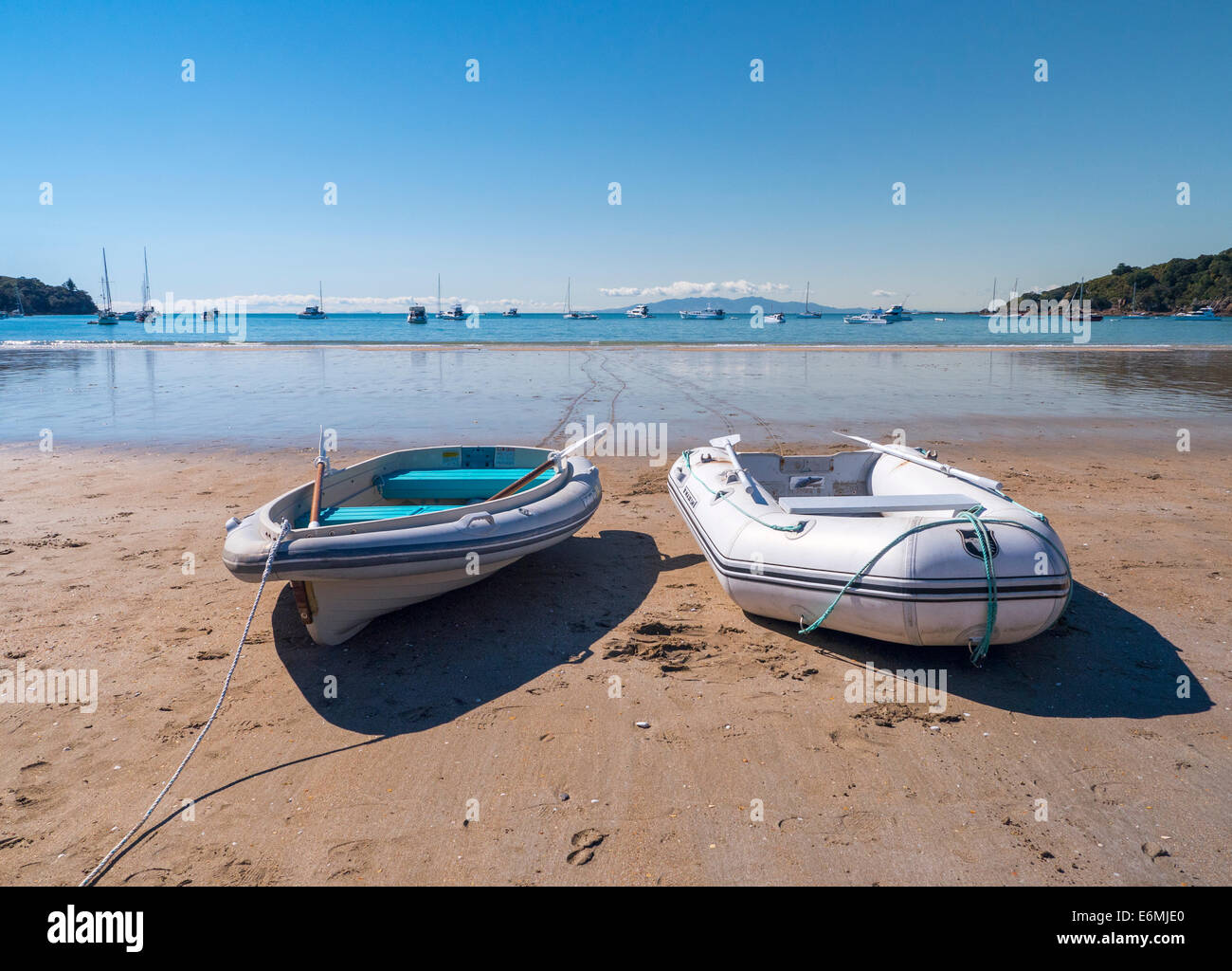 Two inflatable boats on Waiheki Island beach Oneroa, Auckland New