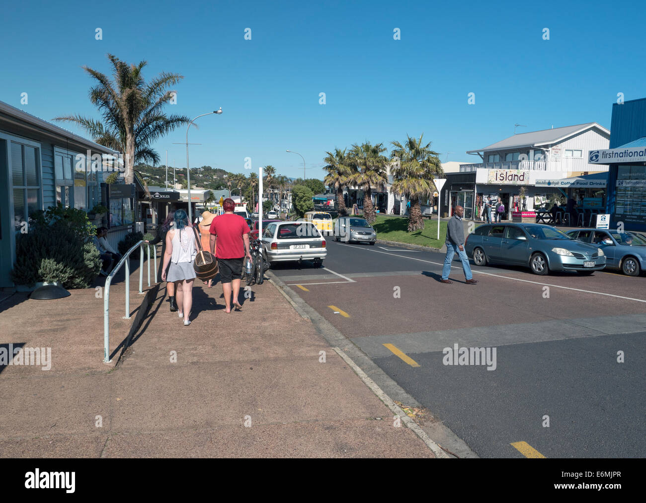 Shoppers and holidaymakers in the main street of Oneroa Town, Waiheke Island Auckland New Zealand Stock Photo