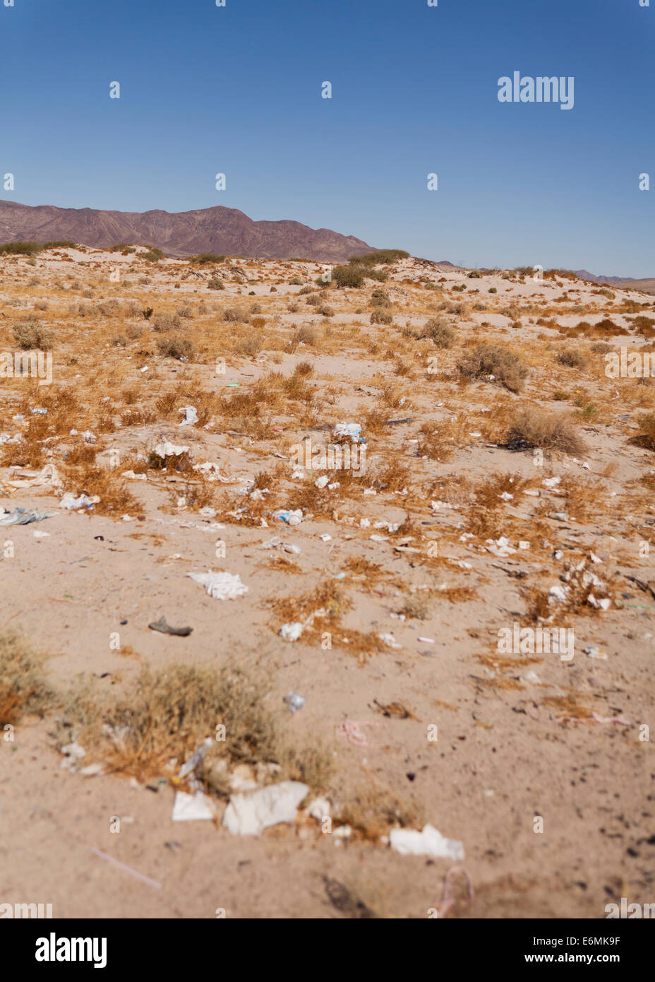 Litter along American Southwest desert  highway - Mojave desert, California USA Stock Photo