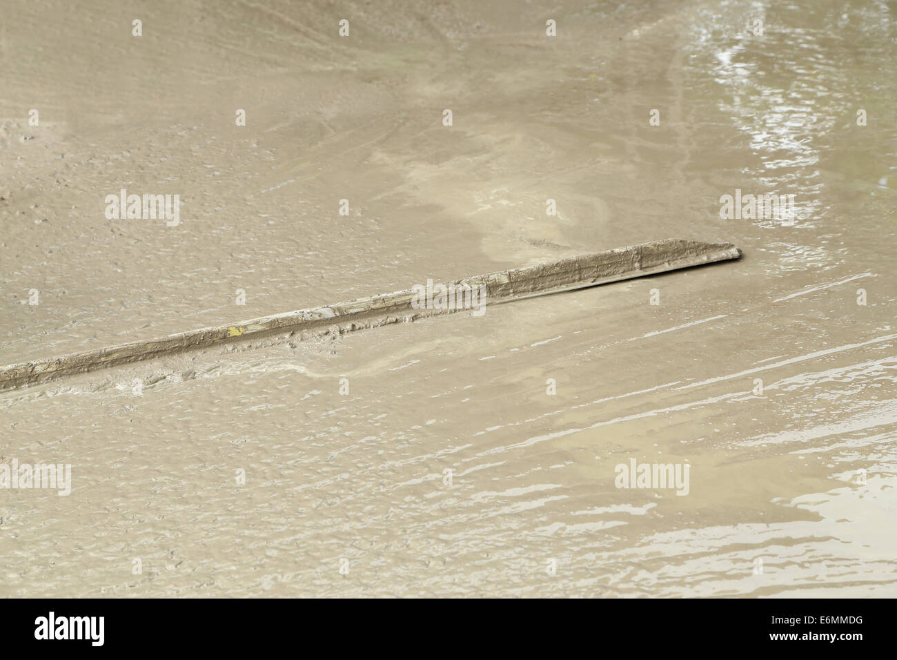 wood Trowel working to Smooth Concrete ground Stock Photo Alamy