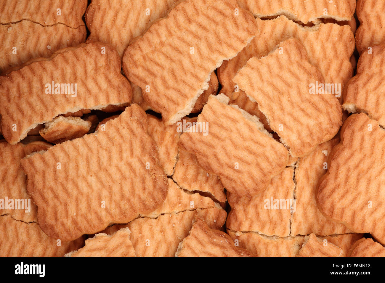 Broken cookies background Stock Photo - Alamy