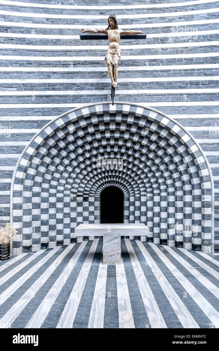 Crucifix, interior view, granite Church of San Giovanni Battista, modern church designed by architect Mario Botta Stock Photo