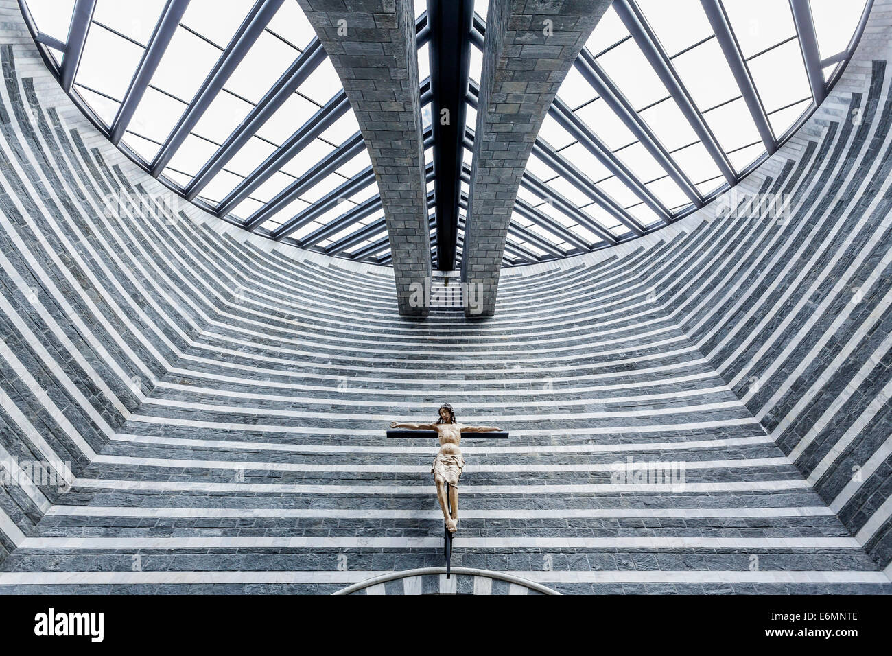Crucifix, interior view, granite Church of San Giovanni Battista, modern church designed by architect Mario Botta Stock Photo