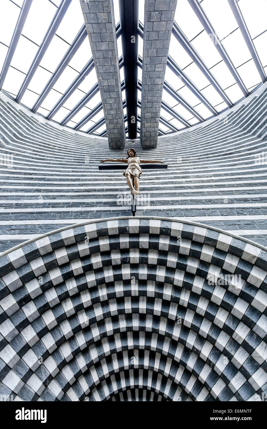 Crucifix, interior view, granite Church of San Giovanni Battista, modern church designed by architect Mario Botta Stock Photo