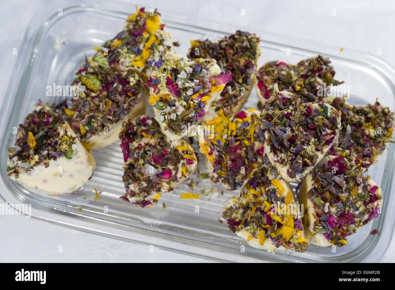 Herb butter with edible blossoms, flowers, Kräuterbutter mit essbaren Blüten, Butter, Food, Kräuterküche, Blütenblätter-Butter Stock Photo