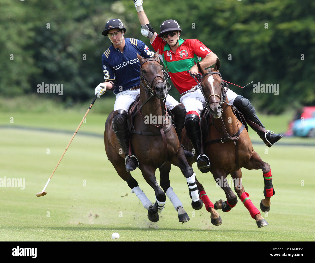Facundo Sola (R) plays for Sumaya and Javier Novillo Astrada for Lucchese polo teams in the 2013 Veuve Clicquot Polo Gold cup Stock Photo