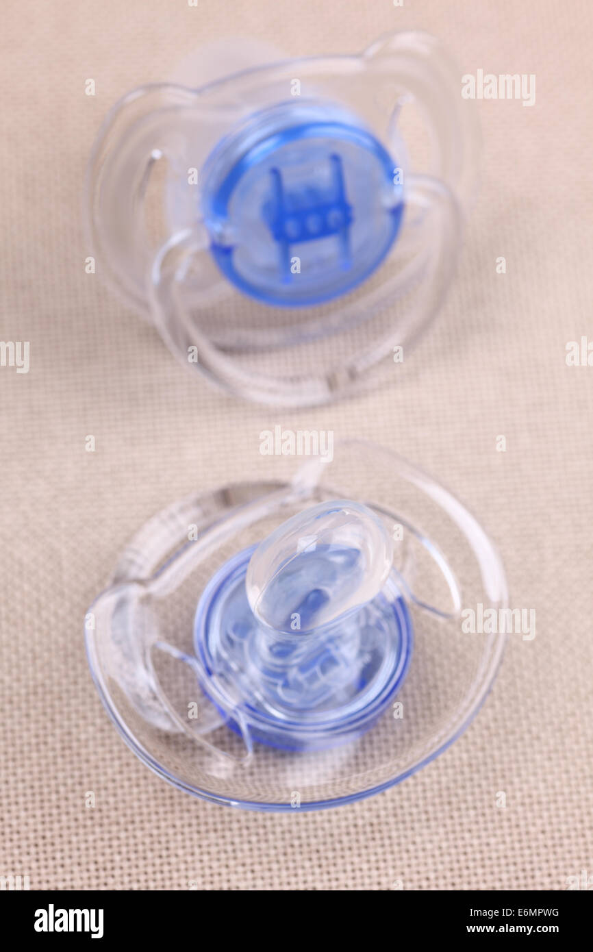 Two baby pacifiers Stock Photo