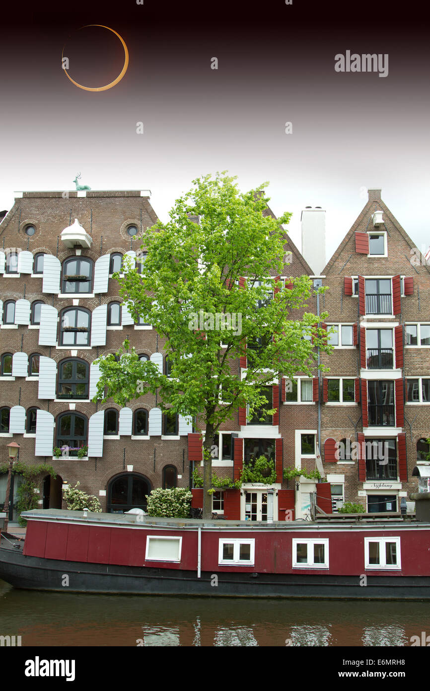 Solar Eclipse over the city Amsterdam. Elements of this image furnished by NASA Stock Photo