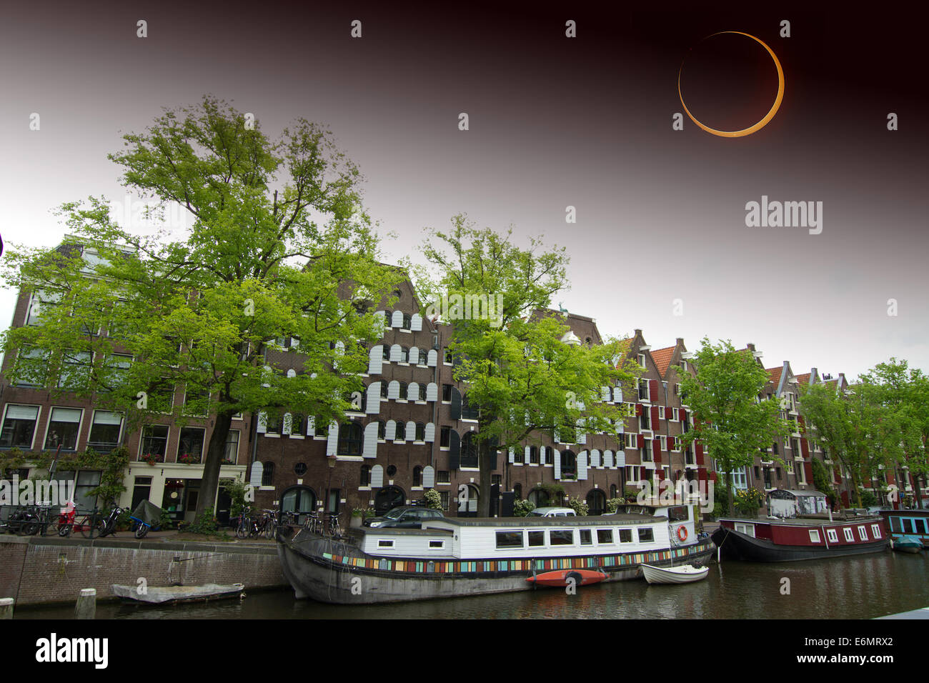 Solar Eclipse over the city Amsterdam. Elements of this image furnished by NASA Stock Photo