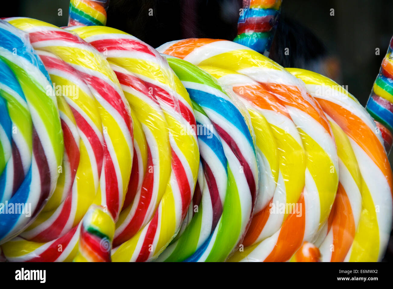 Lots of colorful lollipops on display in a shop Stock Photo