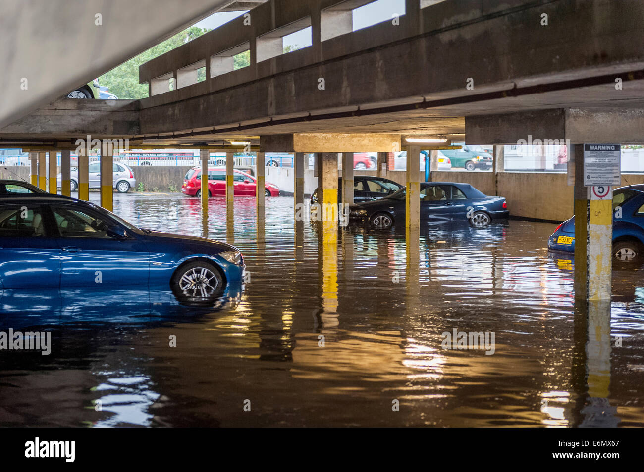 Aquarena swimming pool car park flooded by flash storm in Worthing, West Sussex, UK Stock Photo