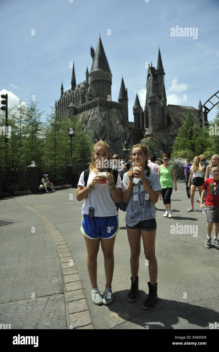 Two young Australian sisters enjoying a drink at Harry Potter World, Universal Orlando Resort, Orlando, Florida, USA Stock Photo