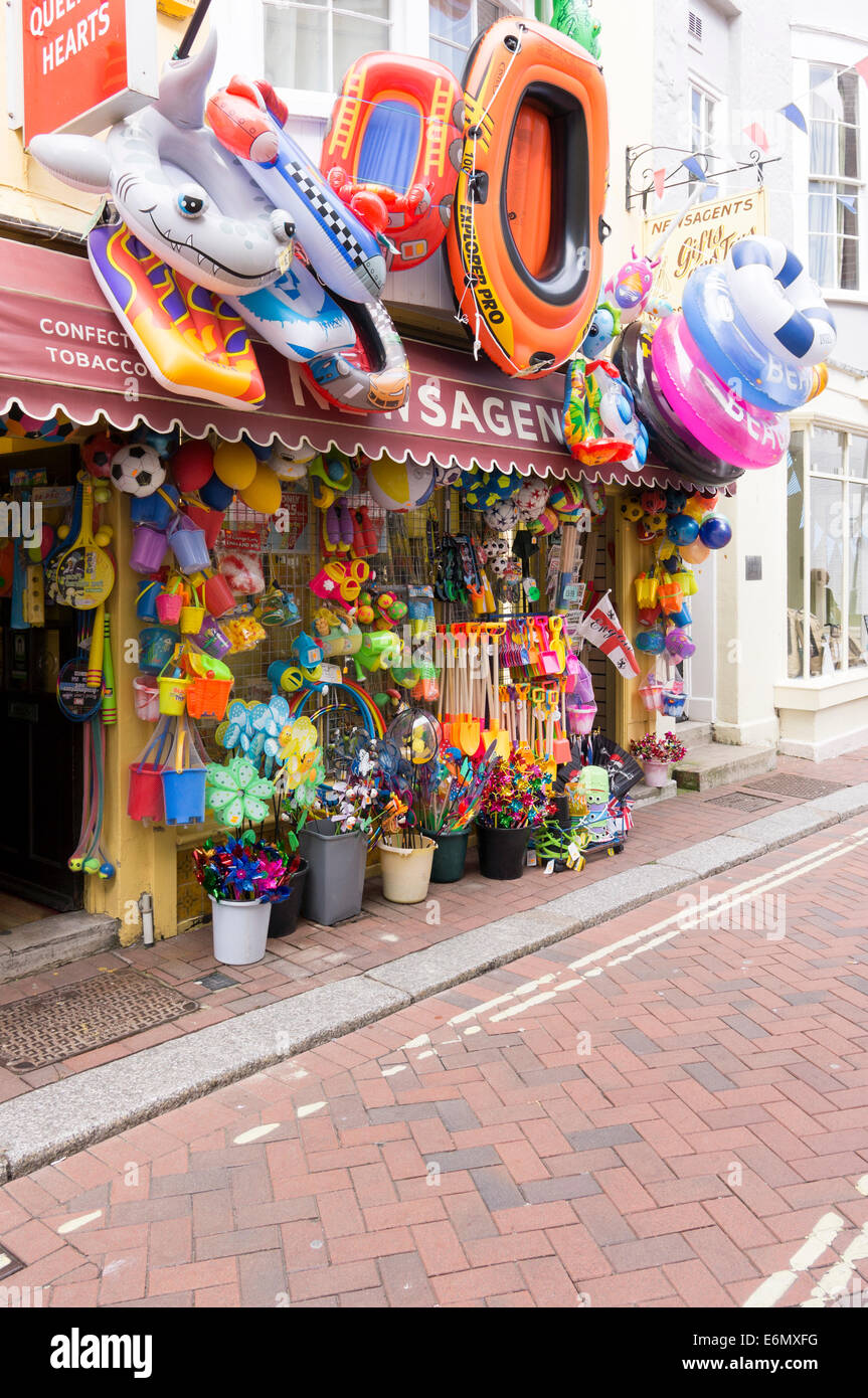 Children's seaside toys and inflatables outside of a shop in Weymouth Dorset UK Stock Photo
