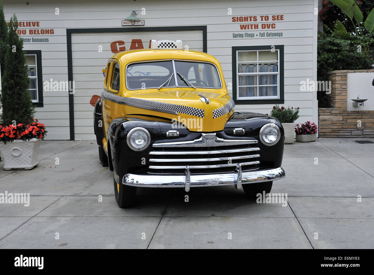 Vintage Ford Yellow cab taxi. Disney's Hollywood Studios, Orlando, Florida, USA Stock Photo
