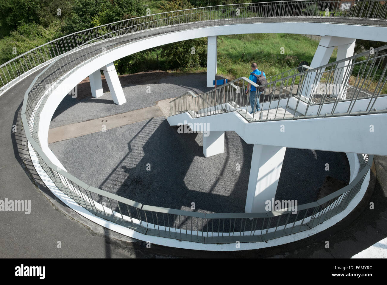 Pedestrian walkway that offers either stairs or ramp to access ...