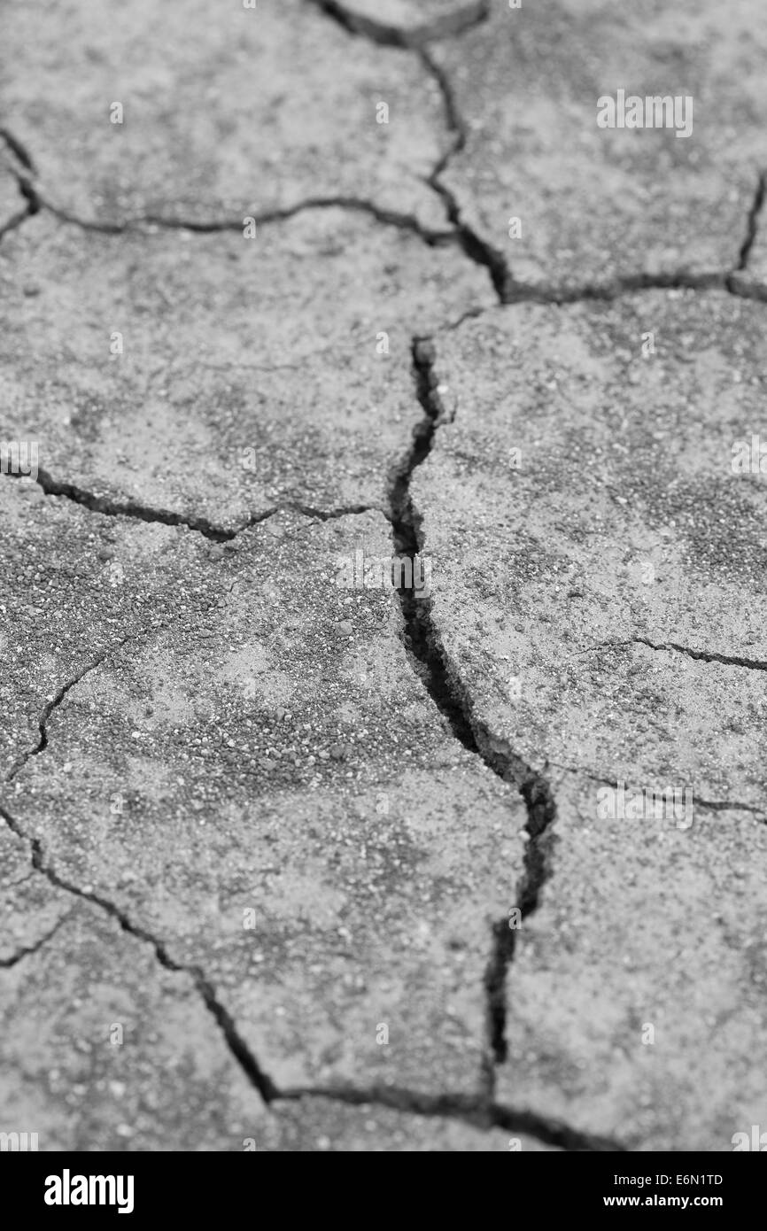 close-up of dry dracked soil ground texture Stock Photo