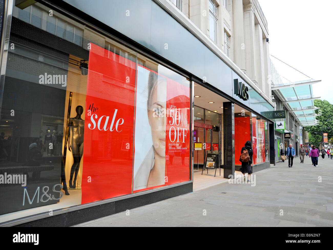 Swindon Wiltshire UK - The main Swindon town centre shopping precinct with M&S department store with Sale Sign in window Stock Photo