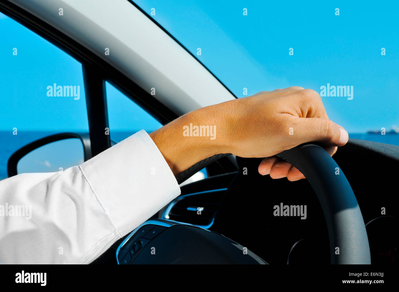 closeup of a man driving a car Stock Photo