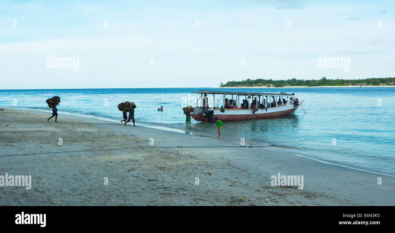 Carriers on Trawangan island. Indonesia. On small Indonesian islands (gili) there are no port, everything comes at the beach Stock Photo