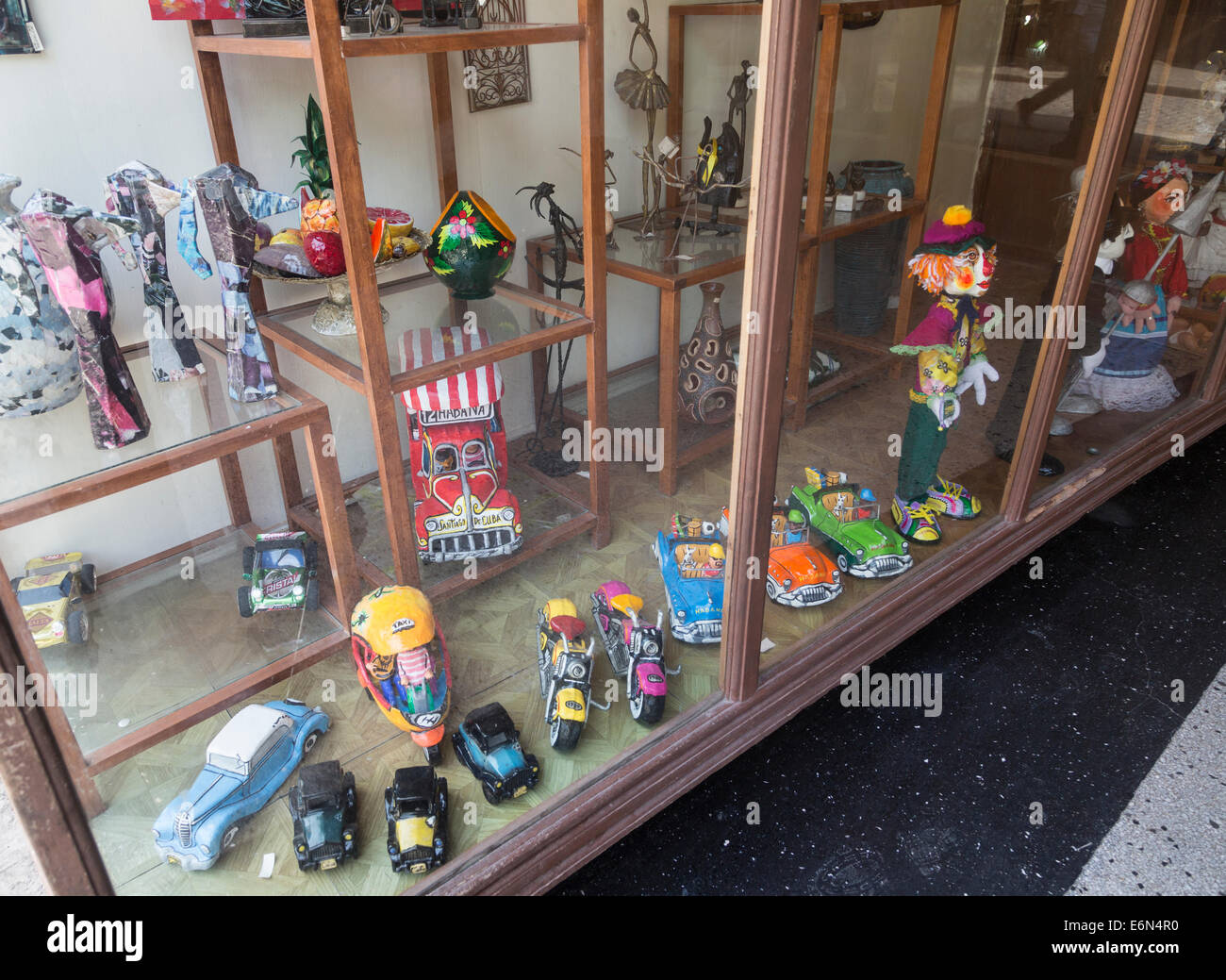 toys and souvenirs for sale in shop window, Calle Obispo, Havana, Cuba Stock Photo
