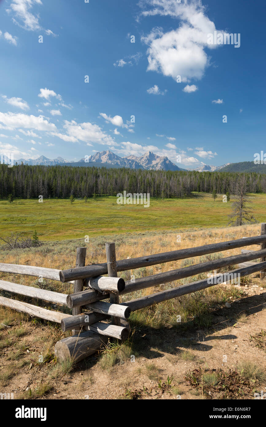 Pole fence and meadow below the Sawtooth Mountains, Idaho. Stock Photo