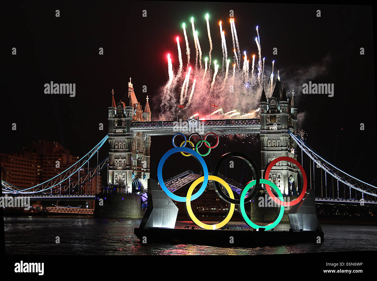 Fireworks above Tower Bridge on the river Thames in London on the night of the 2012 London Olympic opening ceremony Stock Photo