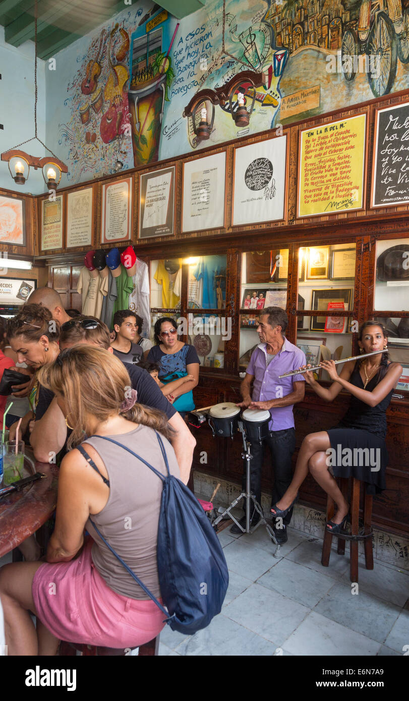 customers and musicians in La Bodeguita del Medio bar, Havana, Cuba Stock Photo