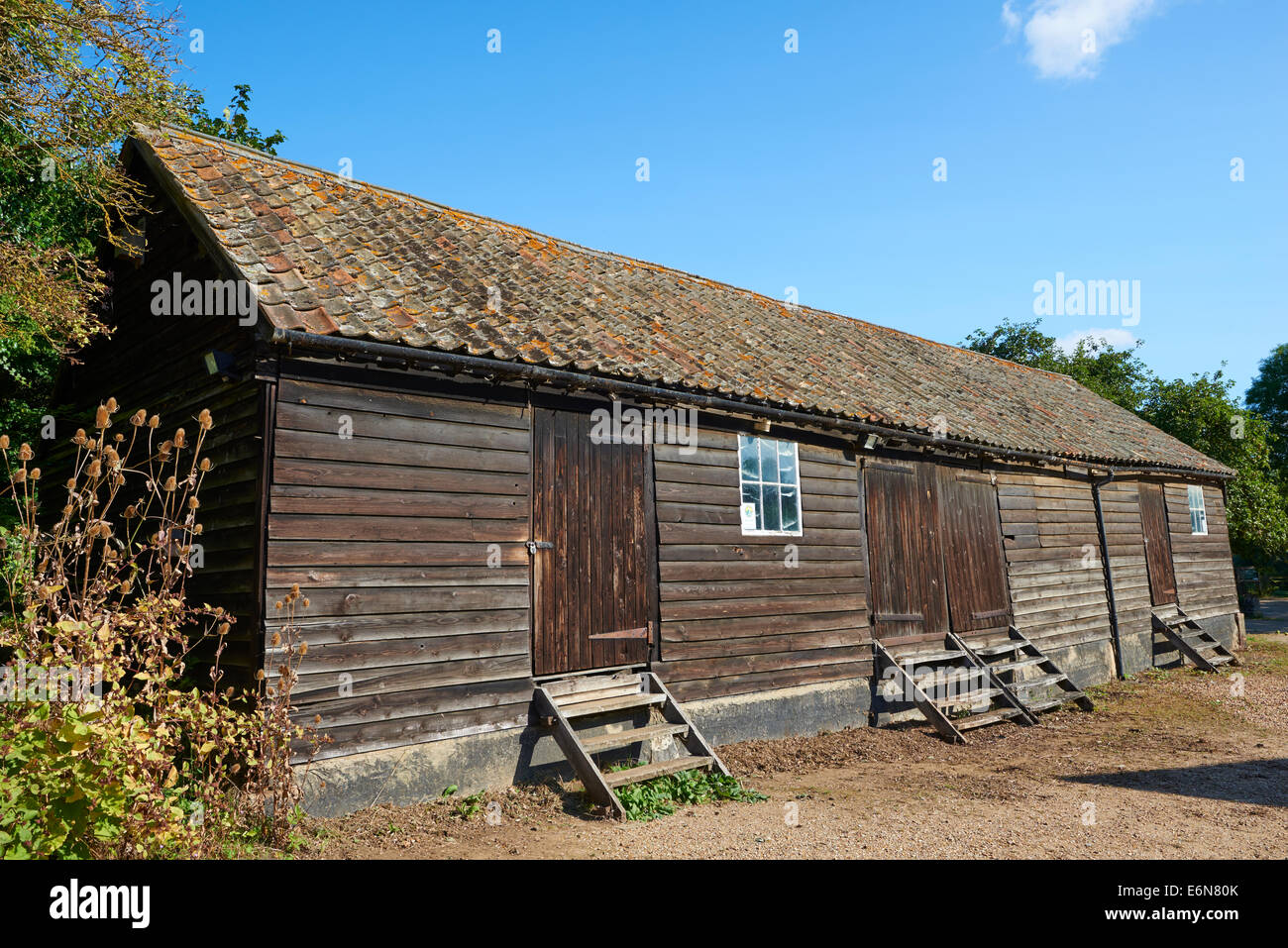 Timber Framed Storage Barn With Weather Boarding And A Pantiled Roof At Bromham Mill Bridge End Bedford Bedfordshire UK Stock Photo