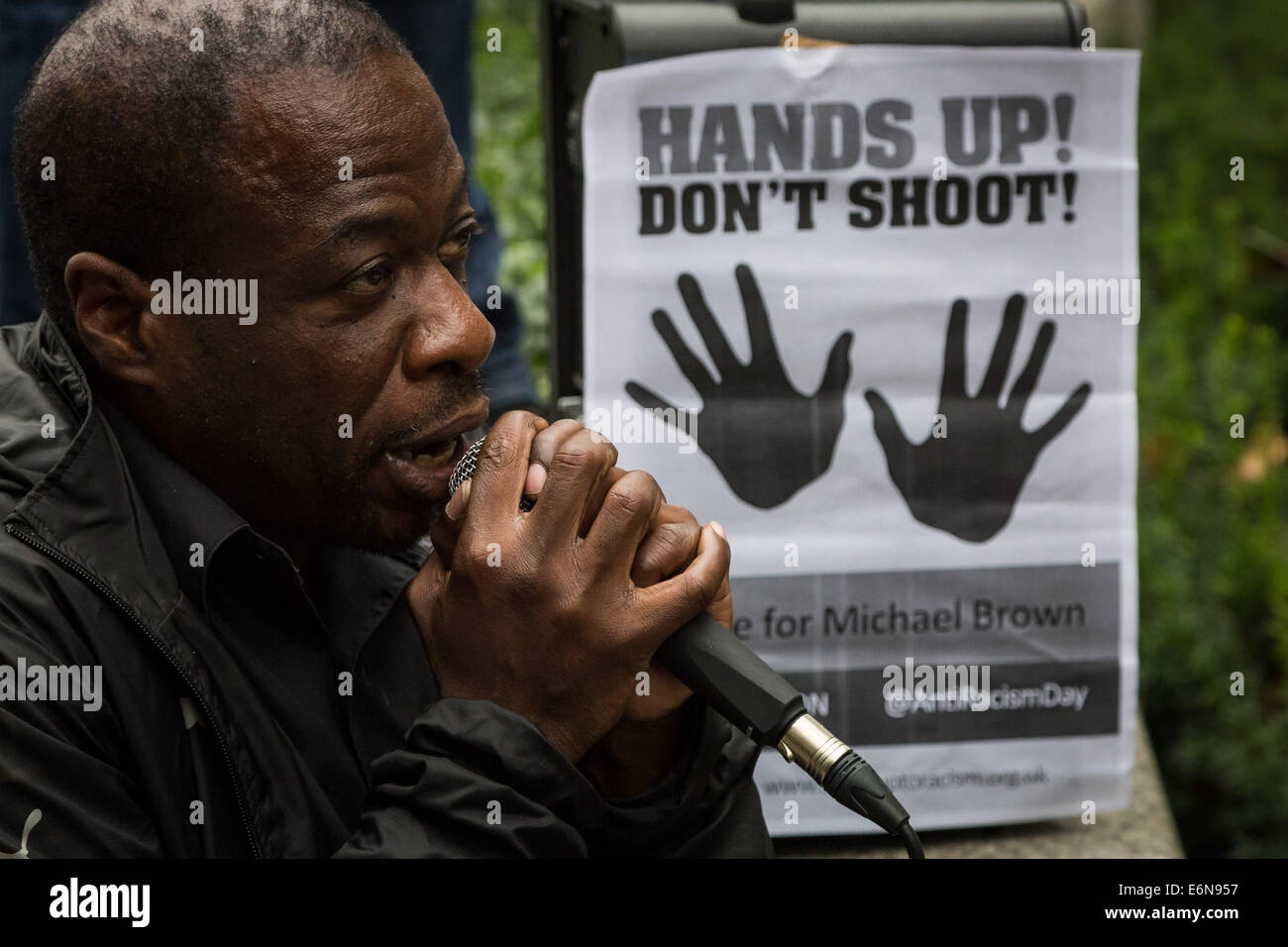 London, UK. 27th August, 2014. ‘Hands Up Don’t Shoot!’ protesters and supporters from Stand Up To Racism protest outside the US Embassy in London in solidarity for the recent death of Michael Brown. On August 9, 2014, Michael Brown Jr., an 18-year-old African American man, was fatally shot by 28-year-old white Ferguson police officer Darren Wilson in the city of Ferguson, Missouri, US. Credit: Guy Corbishley/Alamy Live News Stock Photo