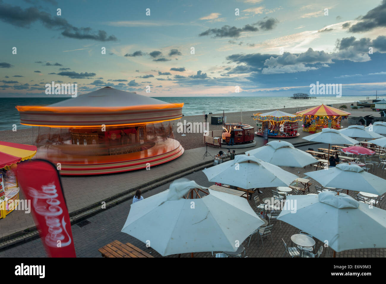 Late summer evening on the seafront in Brighton, England. Stock Photo