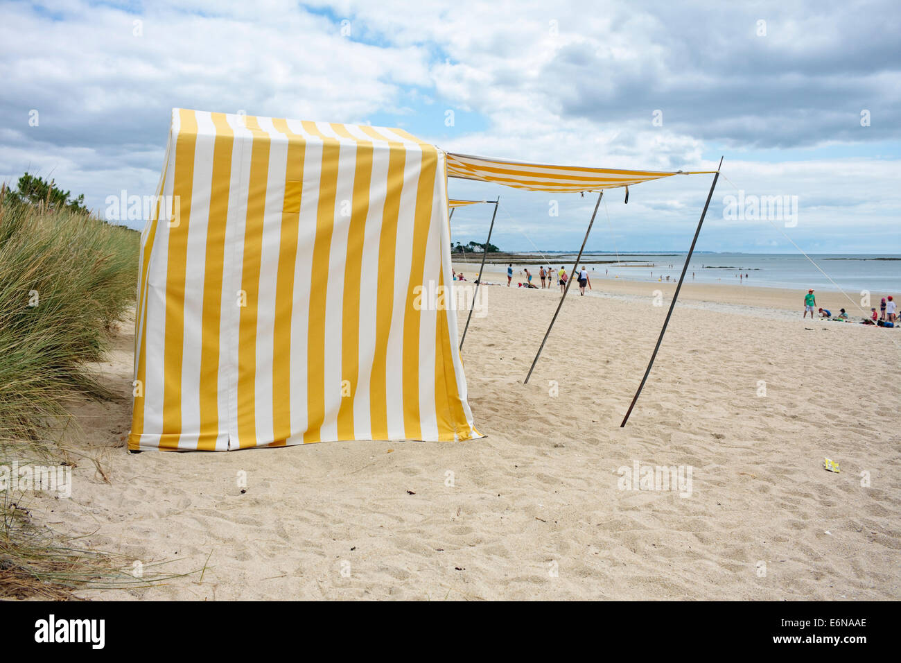 Beach shelters on Carnac Plage, Brittany, France Stock Photo