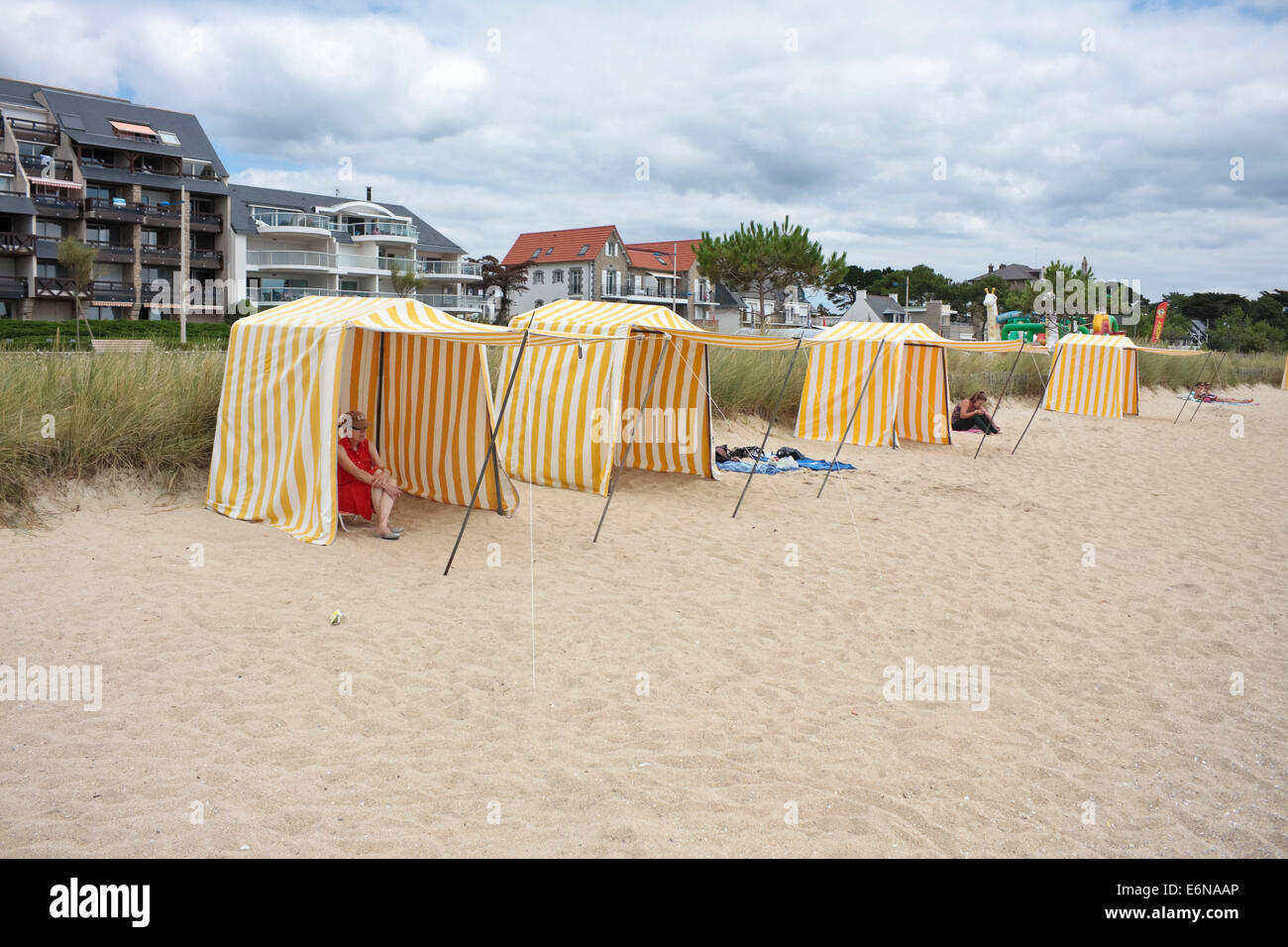 Beach shelters on Carnac Plage, Brittany, France Stock Photo