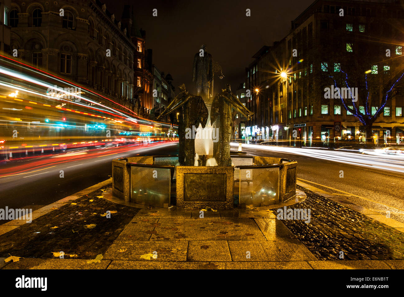 Thomas Davis Statue, Dame Street, Dublin, Ireland, with light streak from traffic Stock Photo