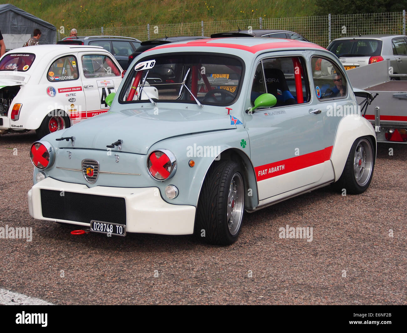 This image features a FIAT 500 ABARTH, a compact sports car known for ...