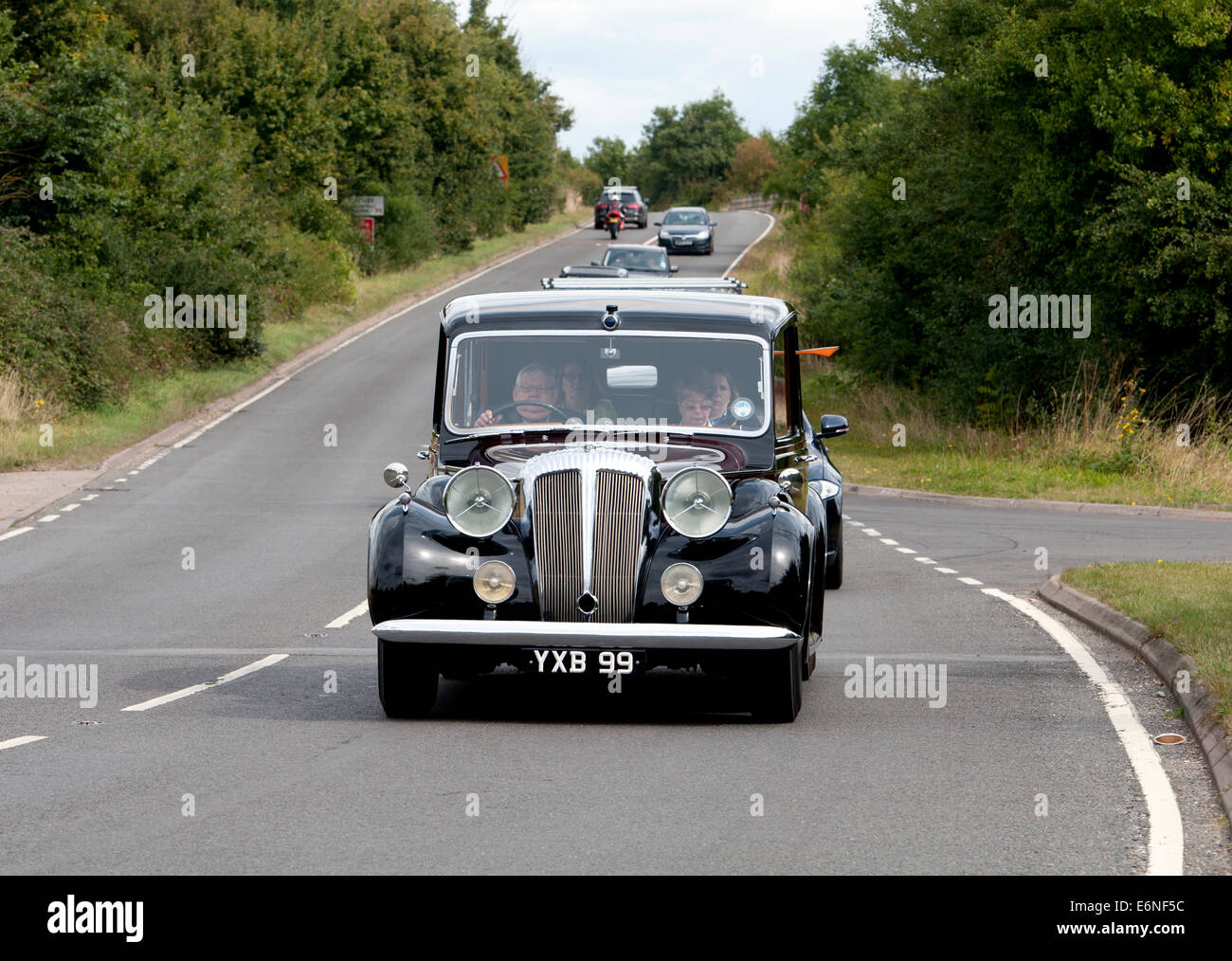 Daimler DE36 Limousine Landaulette car on the Fosse Way road, Warwickshire, UK Stock Photo