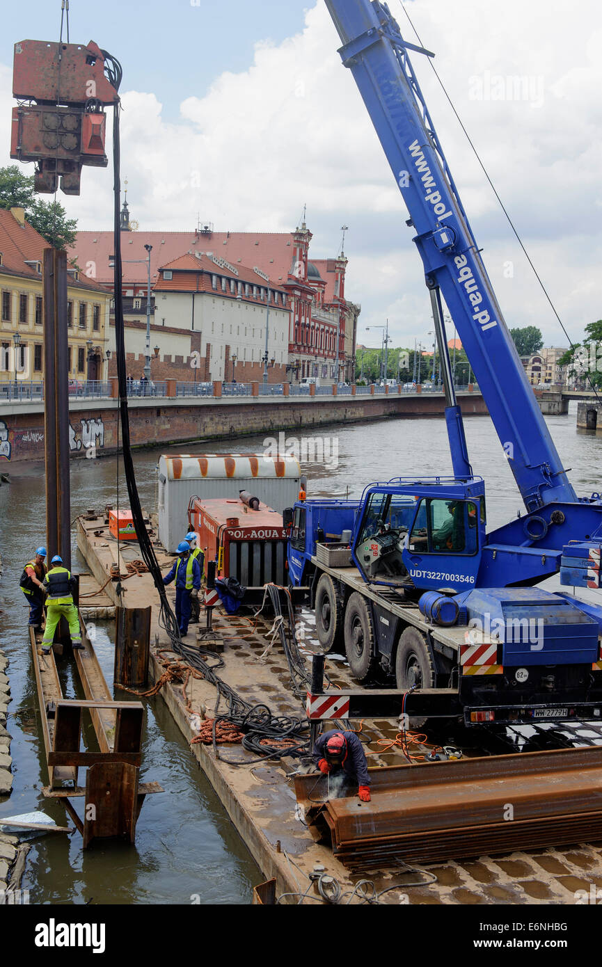 Repairs at the bank of River Oder in Wroclaw, Poland, Europe Stock Photo