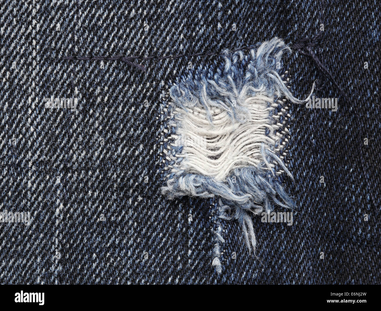 Torn jeans hi-res stock photography and images - Alamy