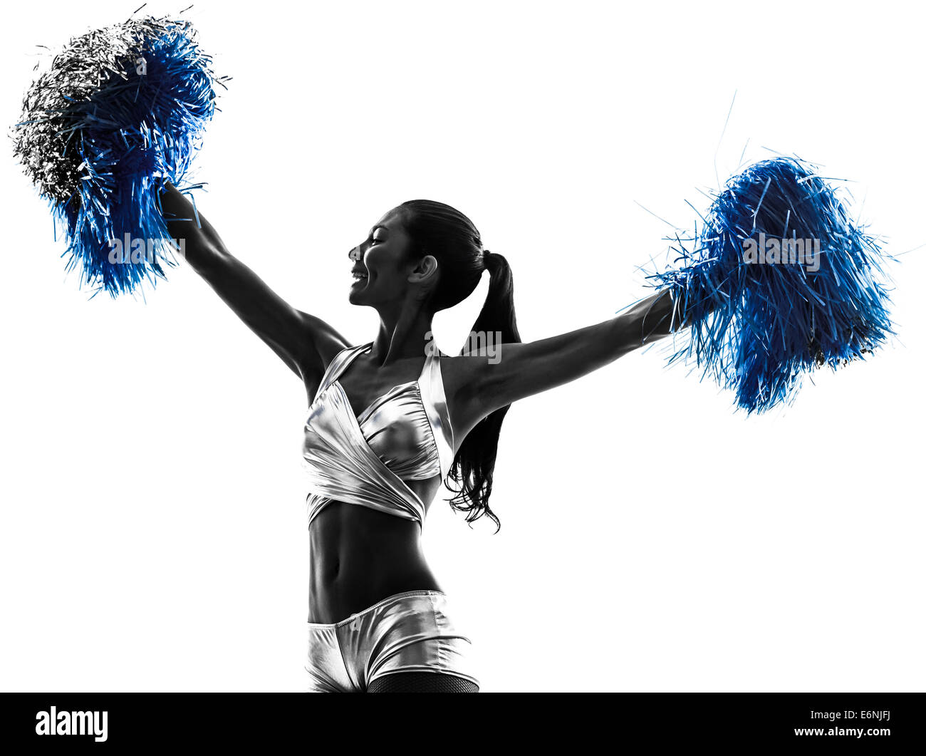 one young woman cheerleader cheerleading silhouette studio on white background Stock Photo