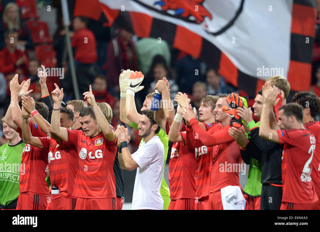 Leverkusen's players celebrate the 40 during the Champions League