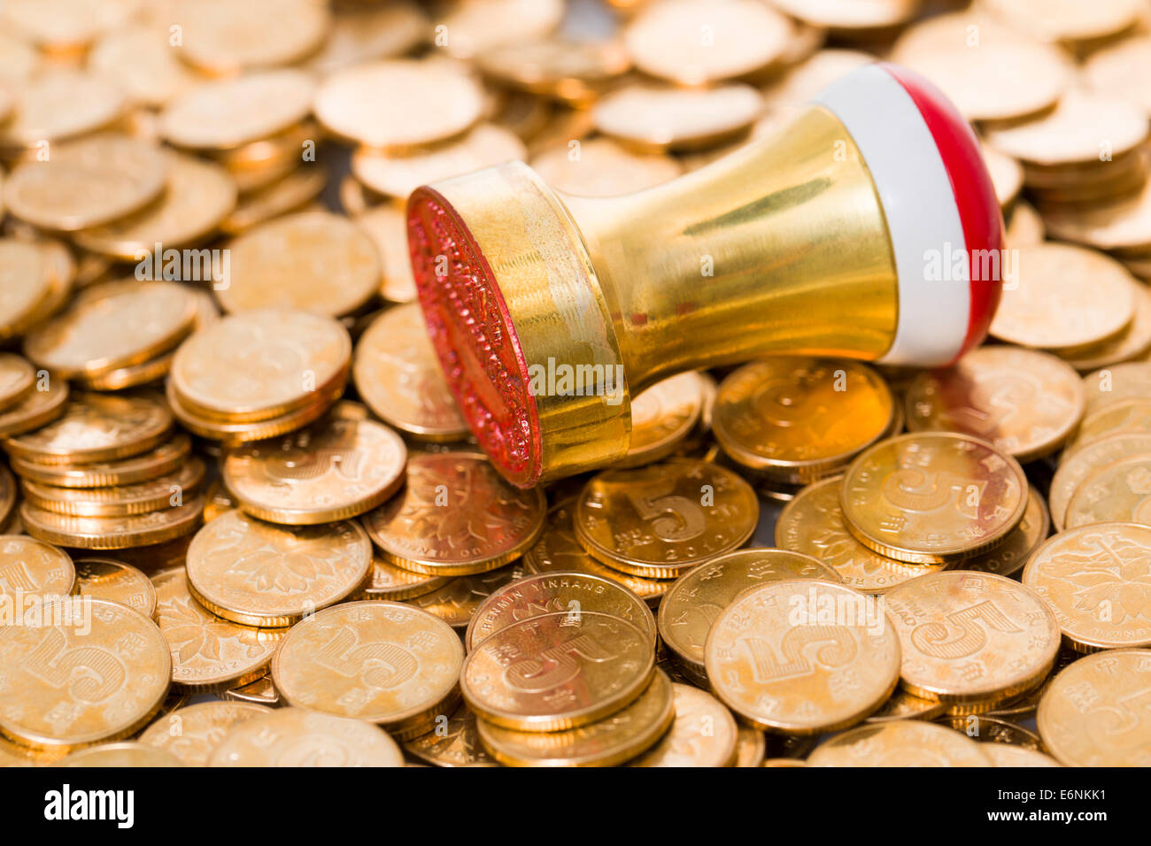 Seal stamper and coins Stock Photo - Alamy