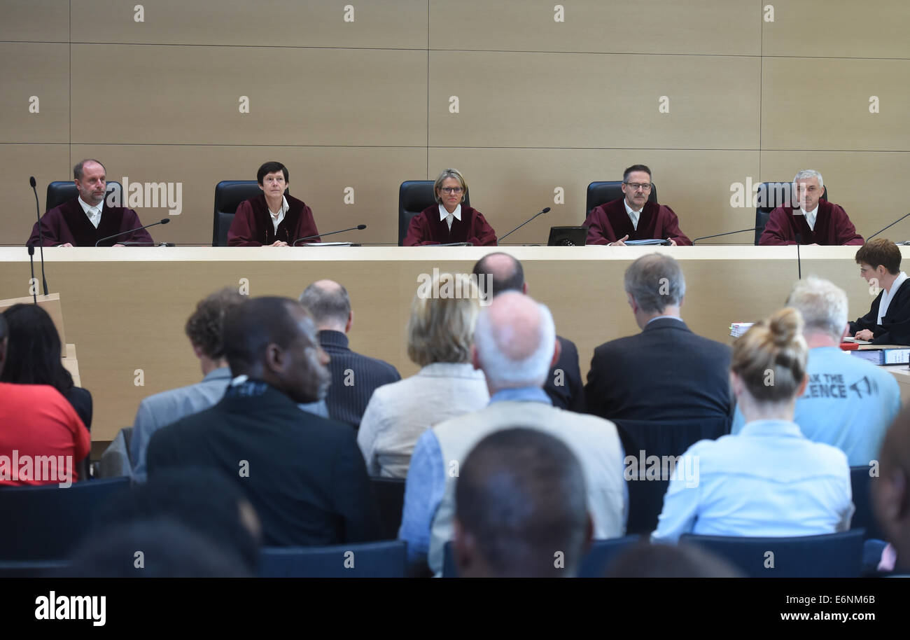 The fourth criminal panel at the German Supreme Court (BHG), Norbert Mutzbauer (L-R), Ellen Roggenbuck, Beate Sost-Scheible (Vorsitz), Juergen Cierniak and Andreas Quentin, before the start of the hearing into the fire death of Oury Jalloh in Dessau in 2005 at the German Supreme Court (BGH) in Karlsruhe, Germany, 28 August 2014. The state court in Magdeburg fined a former group leader 10,800 euros for negligent homicide in 2012. Police officers, public prosecutor and joint plaintiffs filed for an appeal. Photo: ULI DECK/dpa Stock Photo