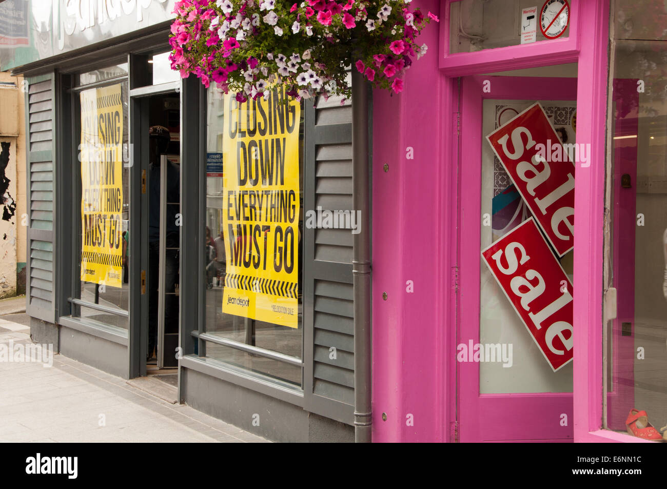 Closing Down Sale Signs in High Street Shop Windows Wexford Town Ireland Stock Photo