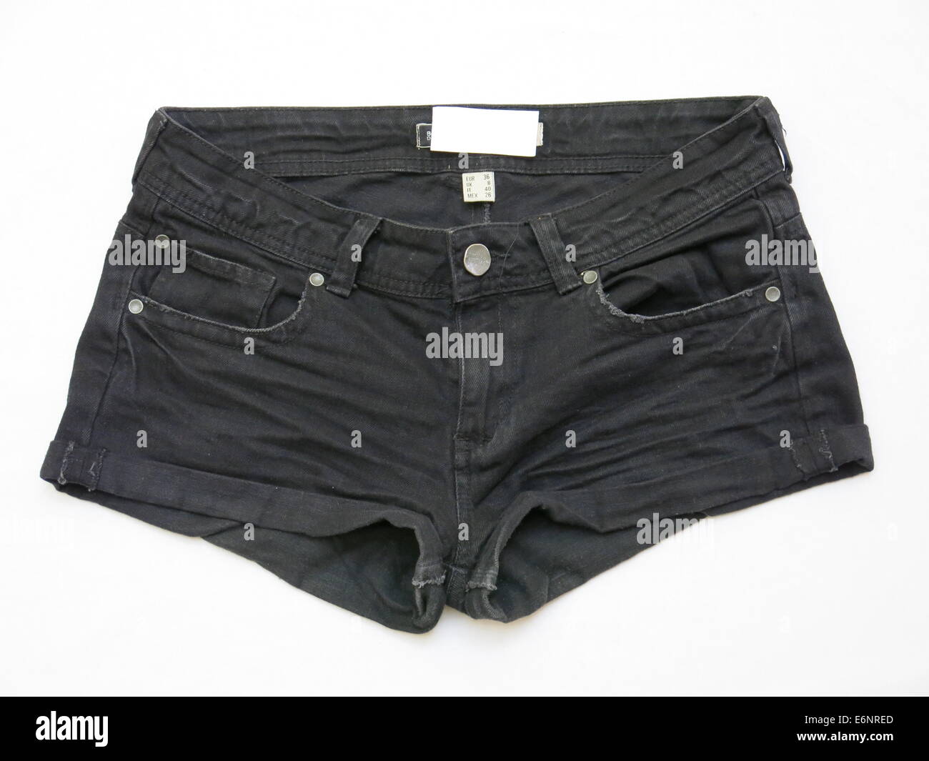 Pair of female shorts isolated against white background Stock Photo - Alamy