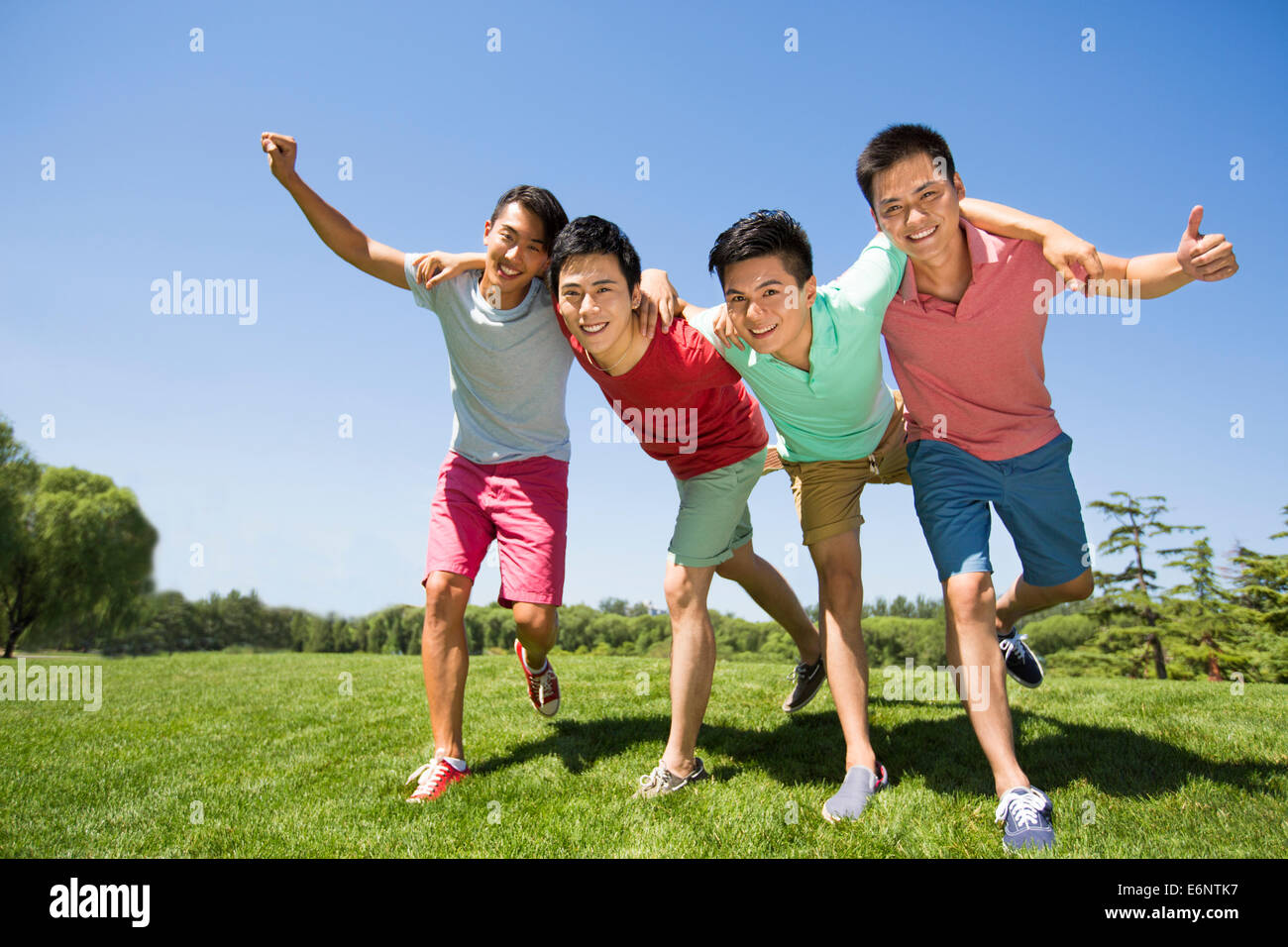 Toothy smile standing open arm hi-res stock photography and images - Alamy